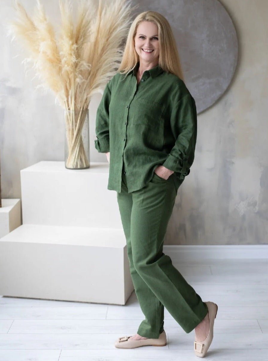 Woman wearing green linen shirt