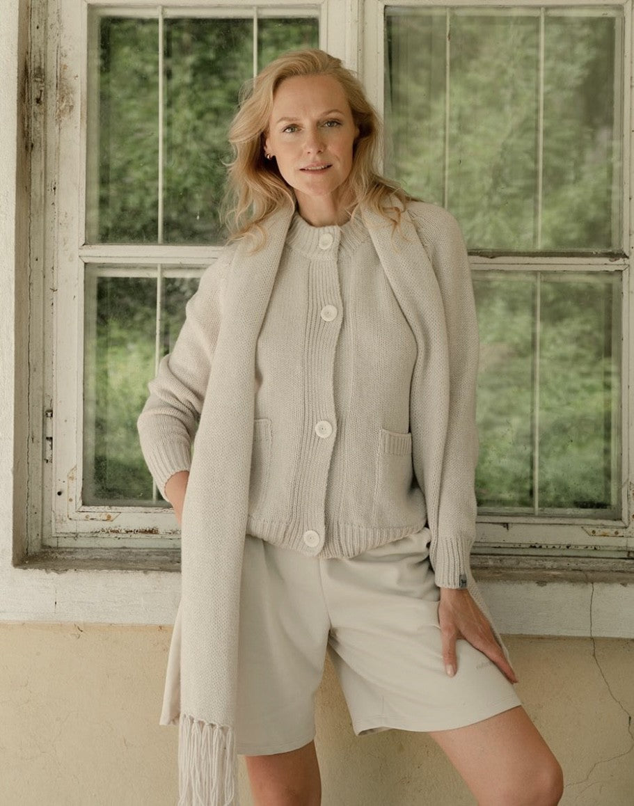 Lady wearing beige cardi