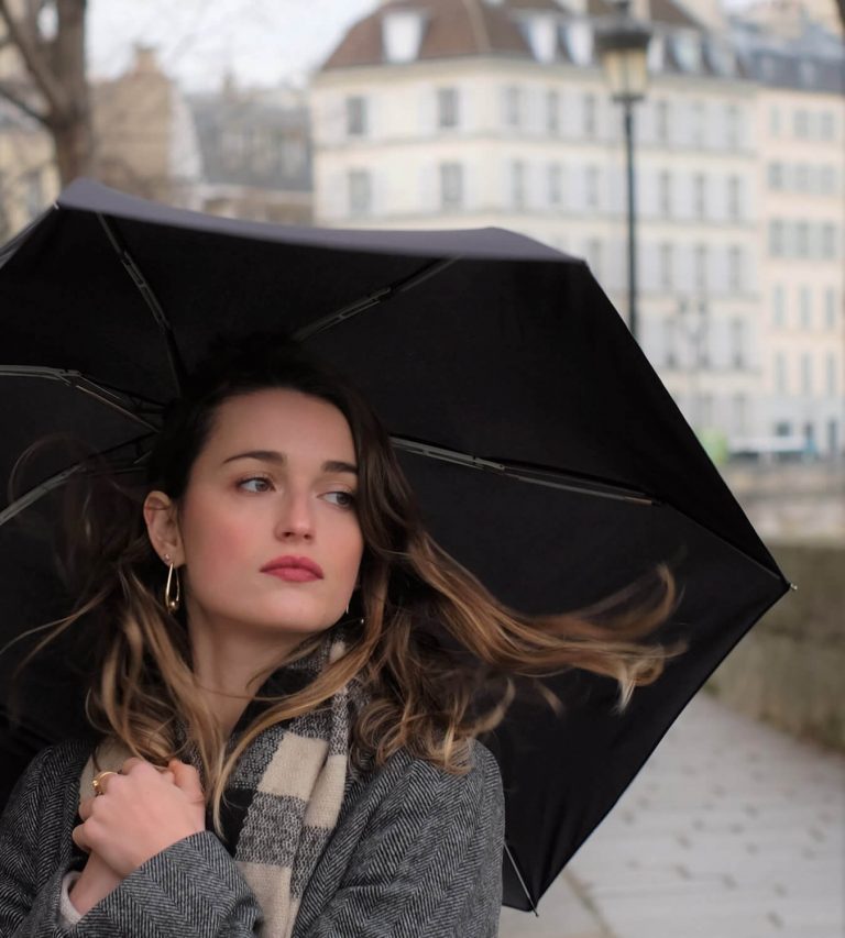 lady with black umbrella