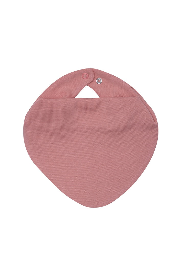 Soft pink linen bib with adjustable snap buttons, displayed on white background