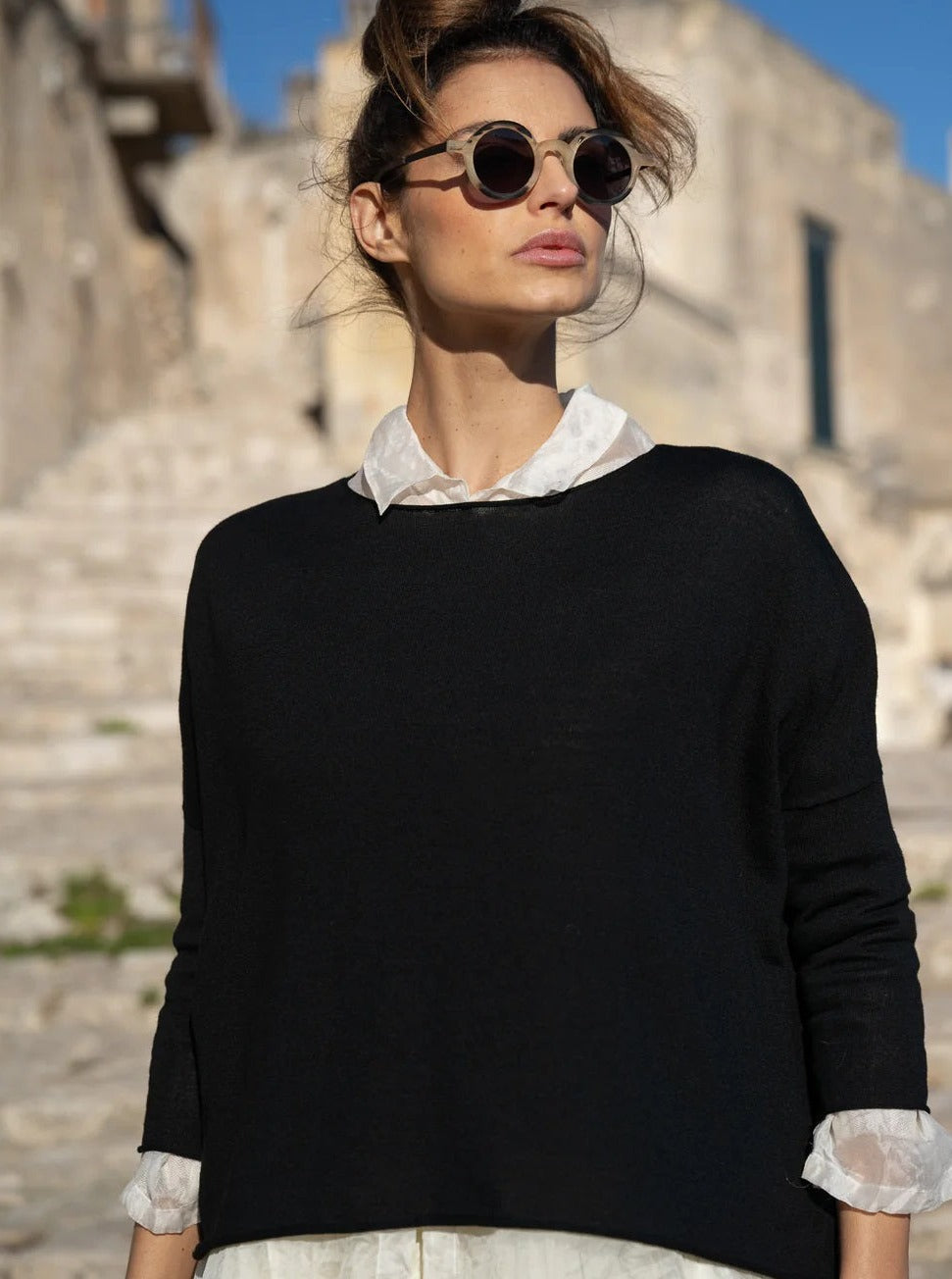 model wearing black merino sweater