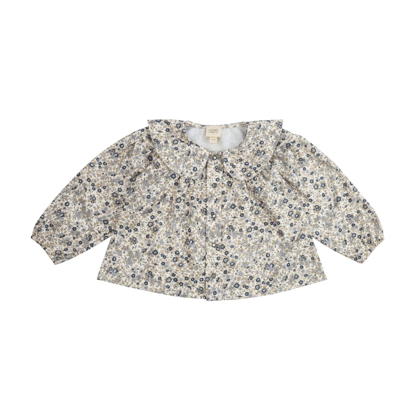 Women's linen floral blouse with long sleeves and ruffled collar, laid flat on white