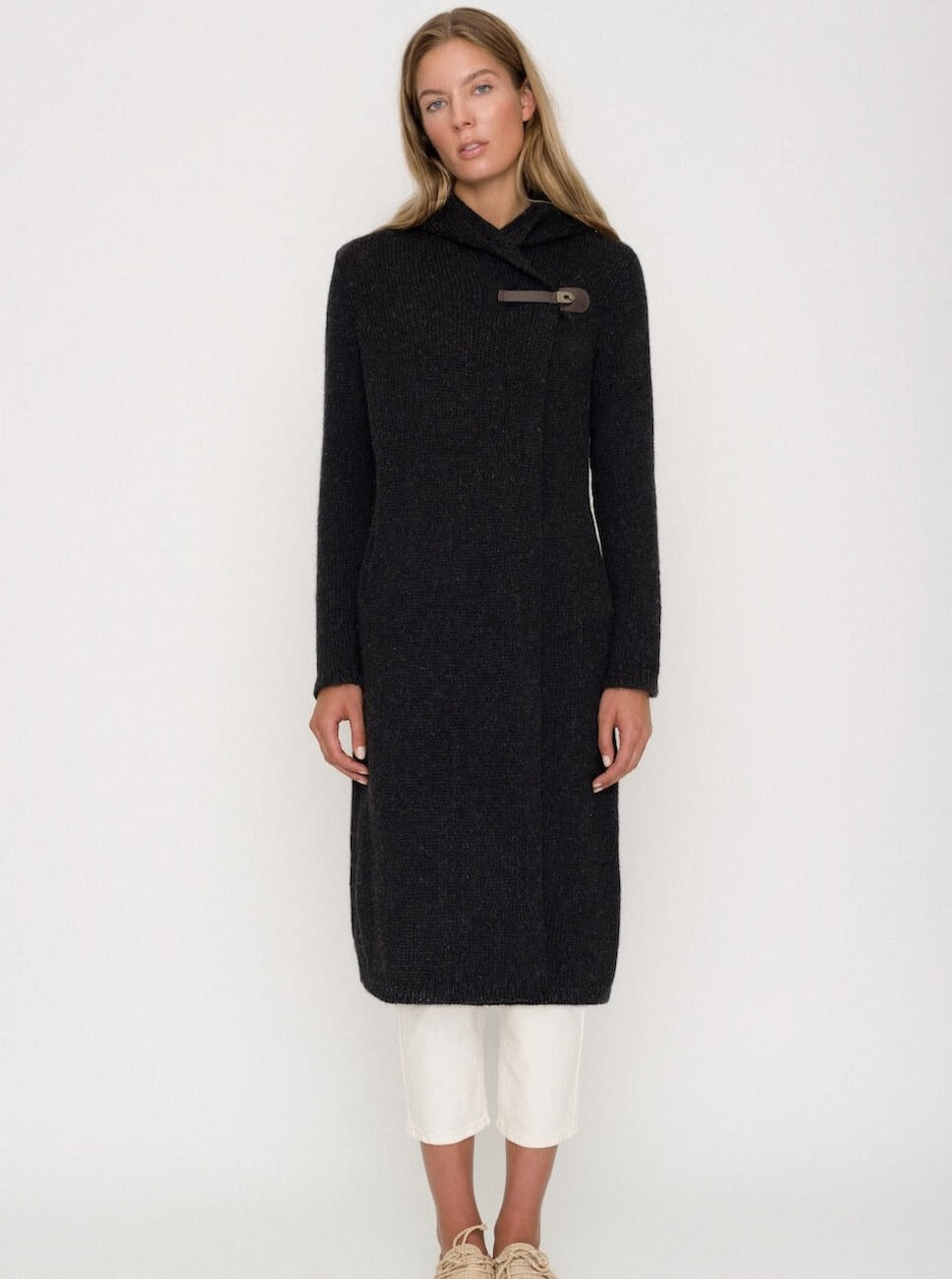 woman wearing black knitted wool coat