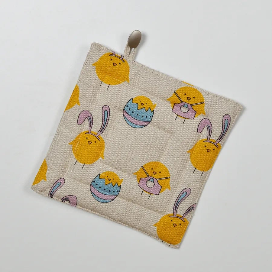 Linen cotton pot holder with easter pattern.