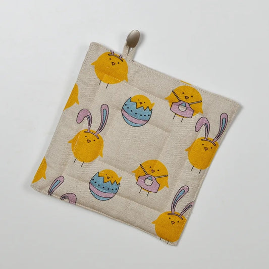 Linen cotton pot holder with easter pattern.