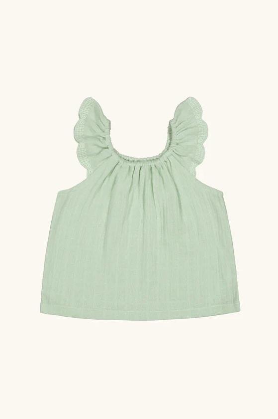 sage green sleeveless blouse with ruffle shoulder