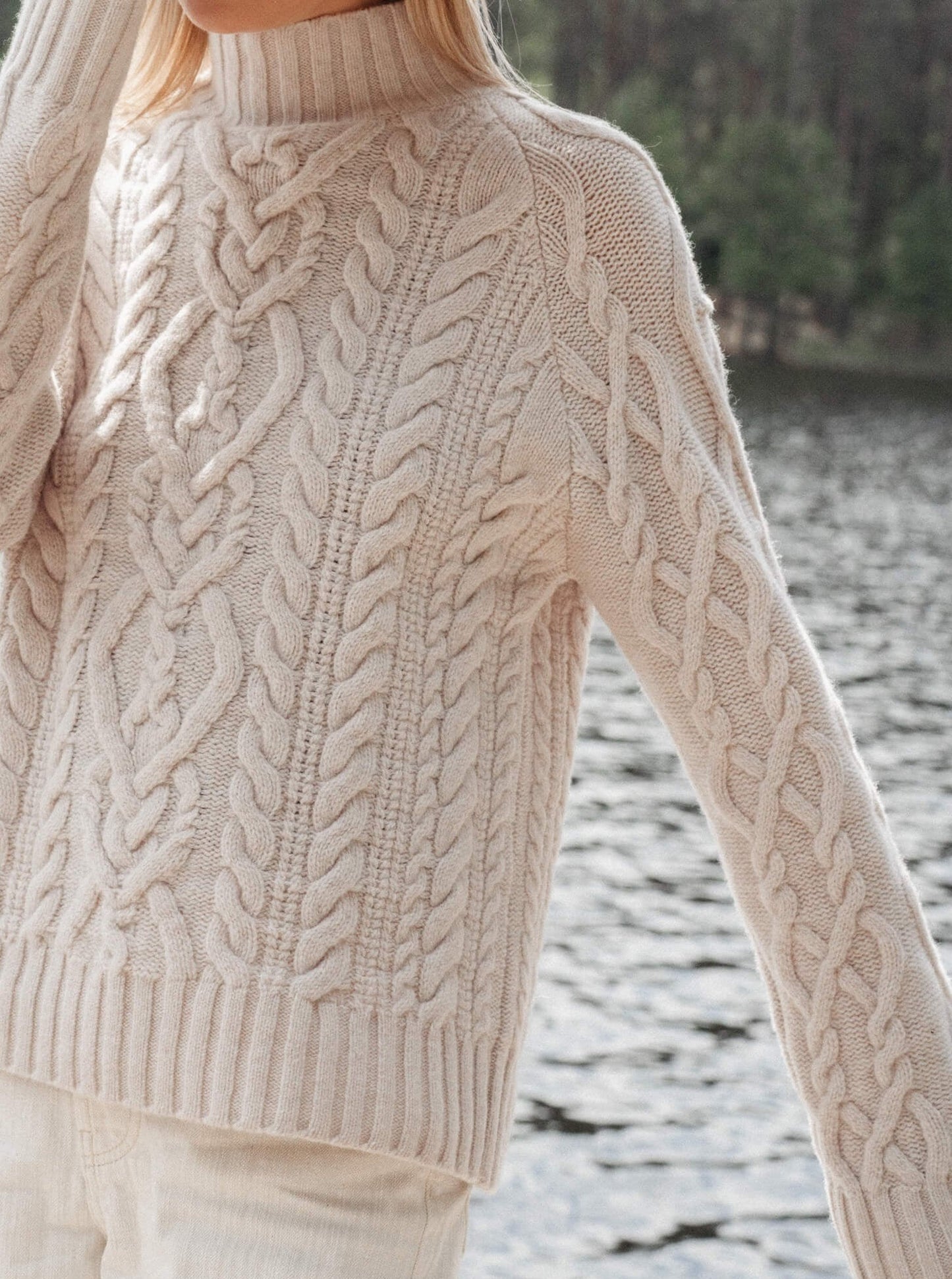 close up photo of cable white sweater