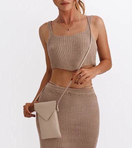 woman with a small phone purse