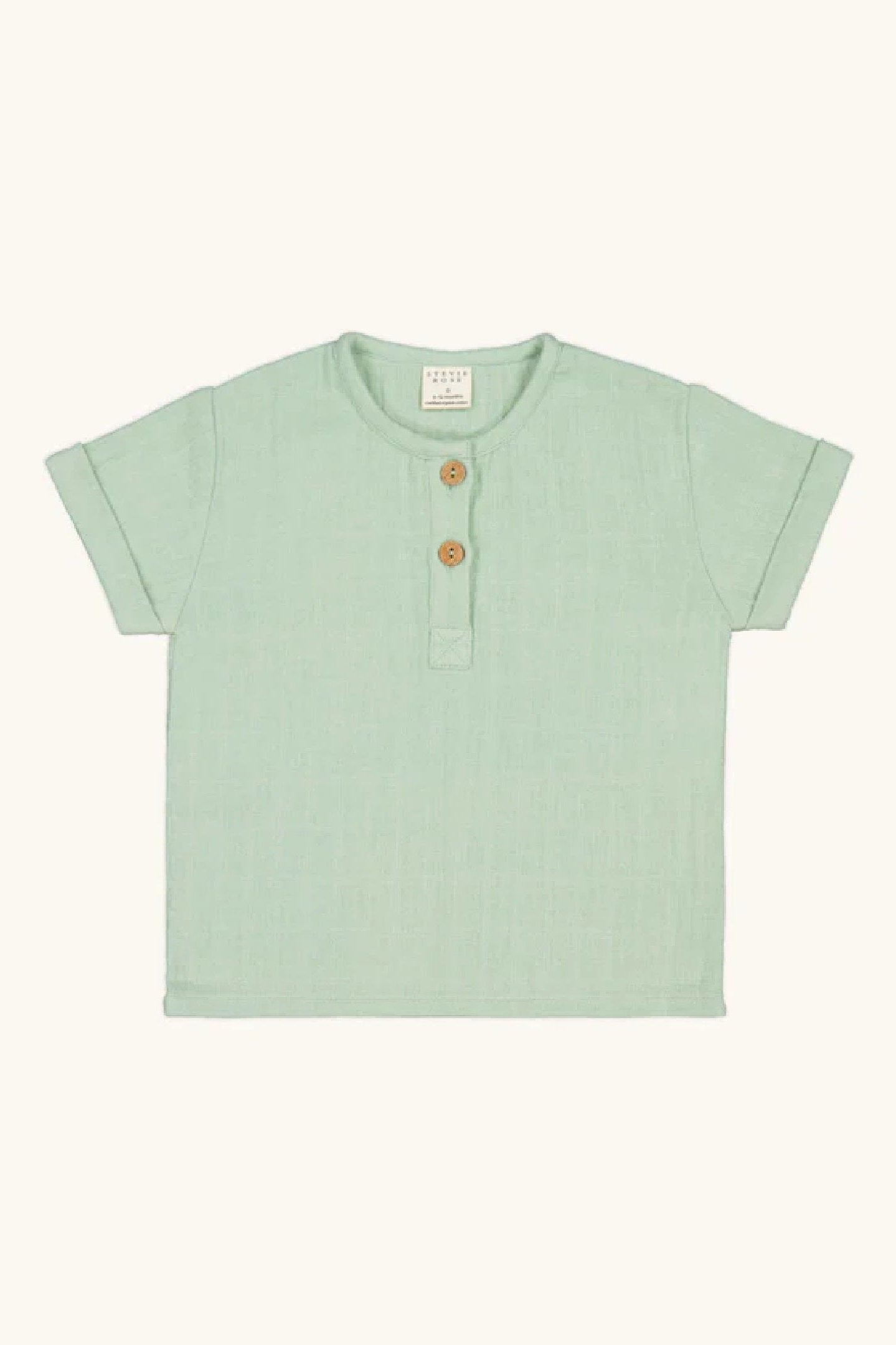Sage green cotton muslin t shirt with wooden buttons