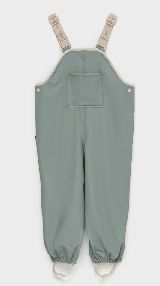 Rain overalls in moss.
