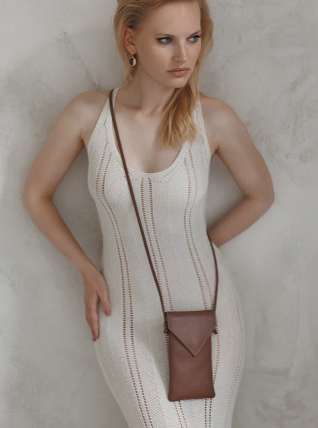 woman wearing a small bag