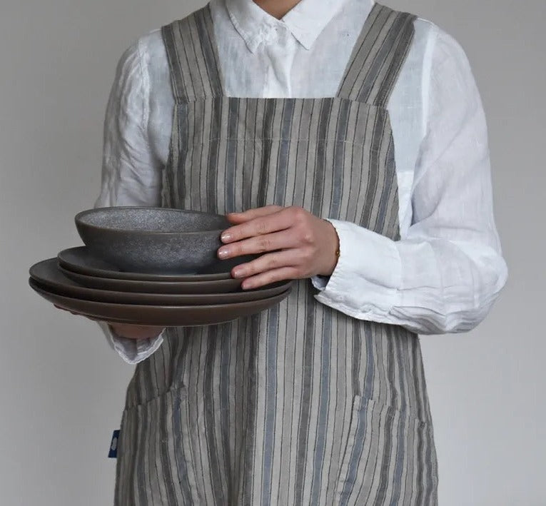 lady wearing white shirt and apron