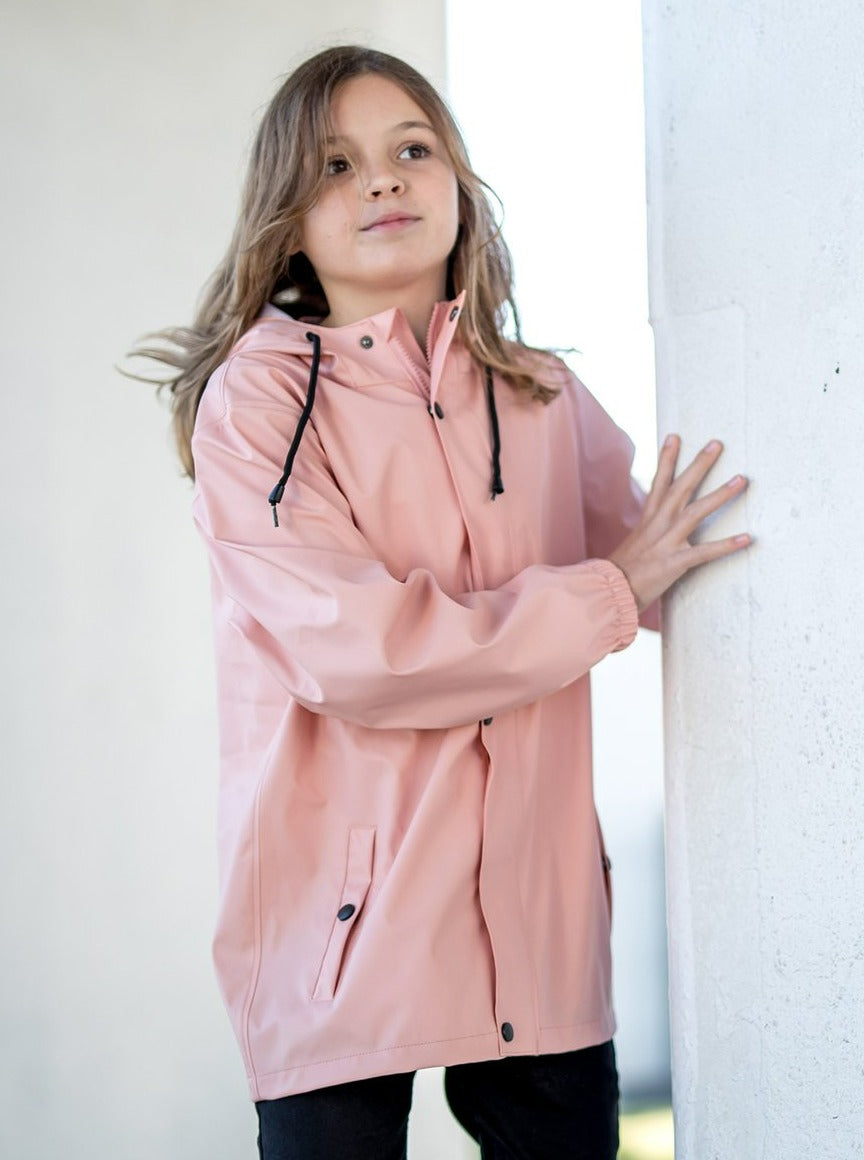 girl wearing waterproof kids jacket pink