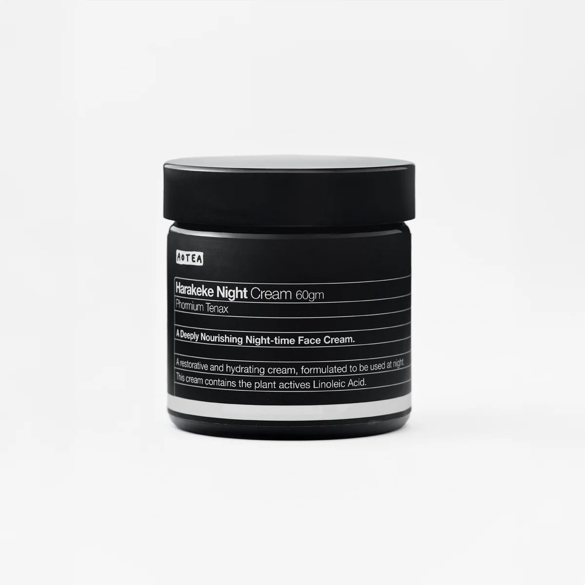Aotea Harakeke night cream in black container.