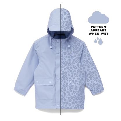 Pale blue magic rain coat with flower field design that appears in the rain.
