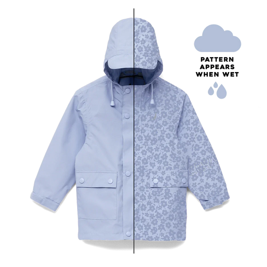 Pale blue magic rain coat with flower field design that appears in the rain.
