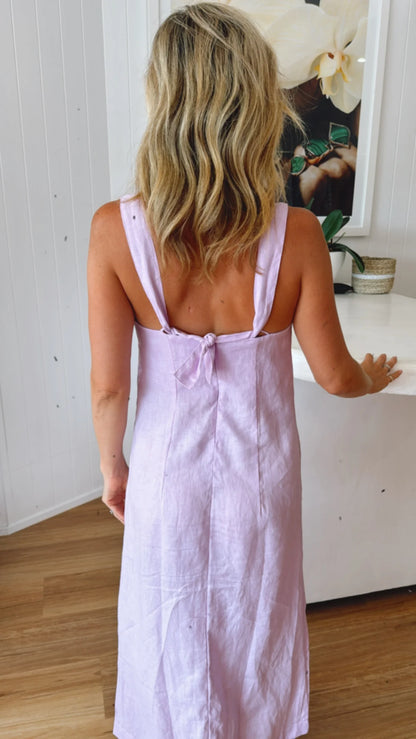 Lilac sundress from back view with should knot detail.