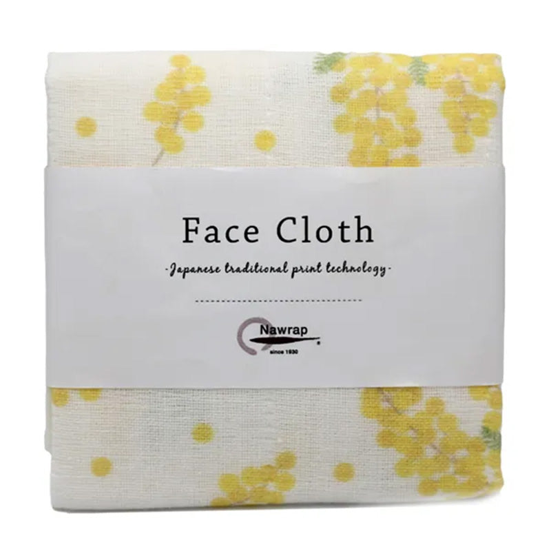 Yellow floral Japanese linen face cloth in white packaging
