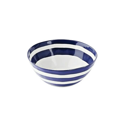 Ceramic bowl with blue and white stripes, modern kitchenware on white background