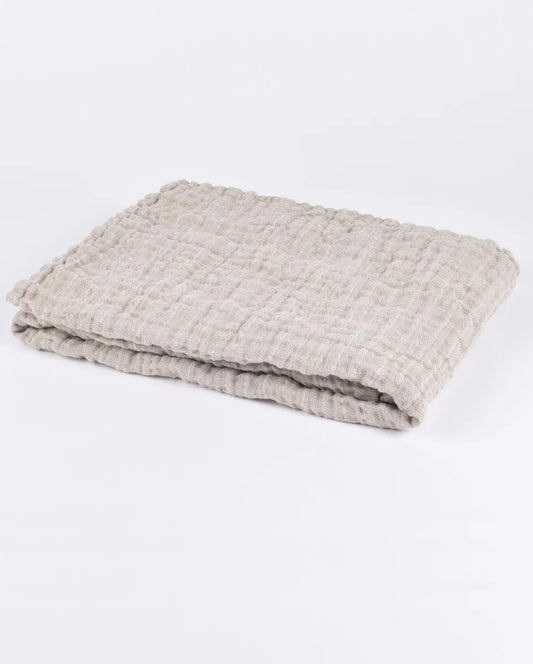 Linen baby blanket in natural colour.