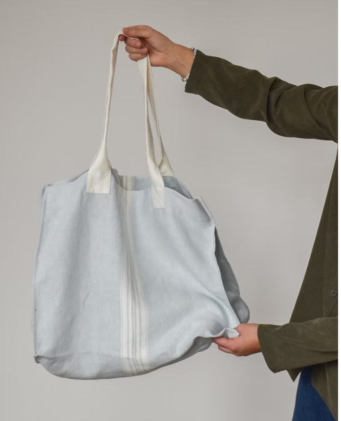 Pale blue reusable linen bag.