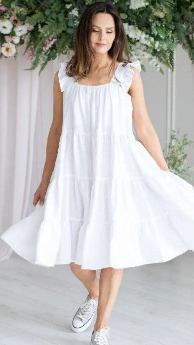 Woman wearing white linen dress