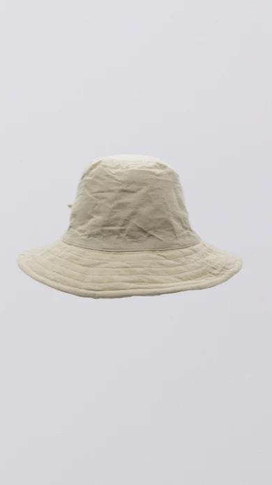 Taupe bucket hat with reversible island stripe.
