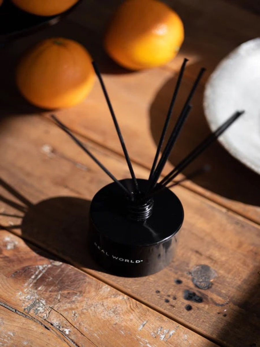 Orange blossom diffuser in black ceramic container