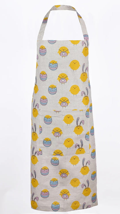 Linen cotton apron with easter pattern and adjustable straps and front pocket.