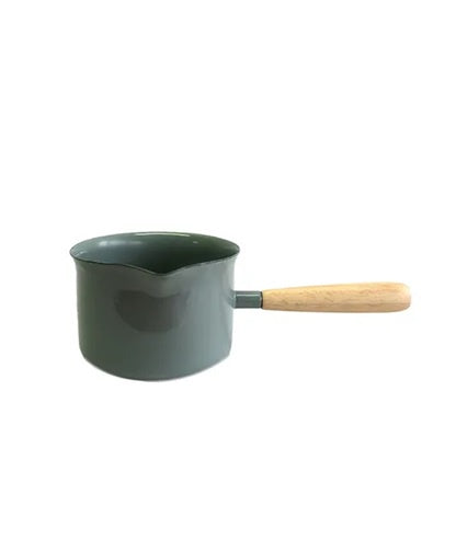 Enamel gravy make wth wooden handle in taragon.