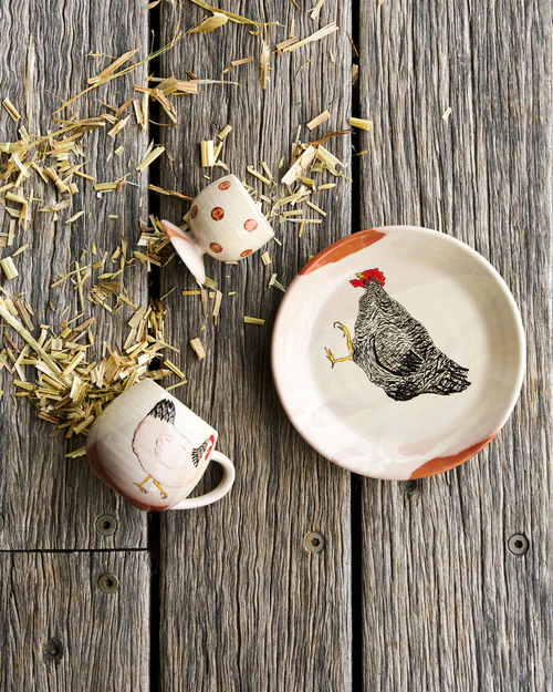 Henny Penny three piece stonewear set with cup saucer and egg cup.