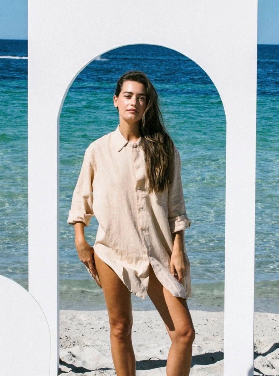 Woman wearing sand linen shirt