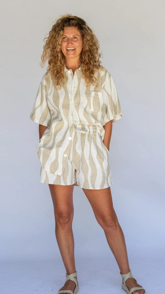 Model wearing oversize island stripe top front view