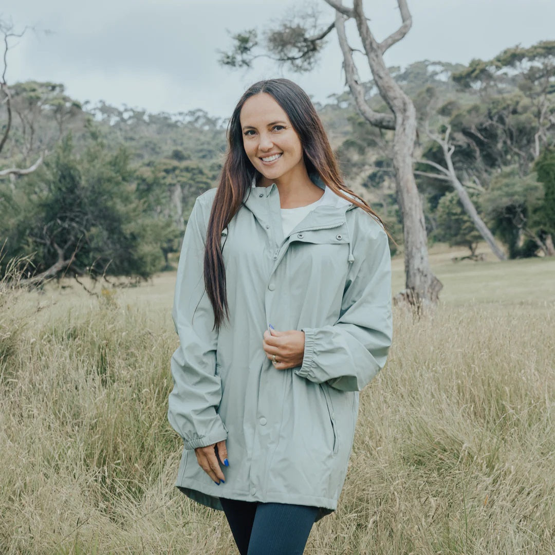 model wearing moss rain jacket