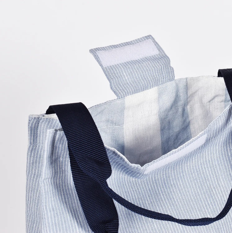 lining of linen lunch bag with light blue stripes