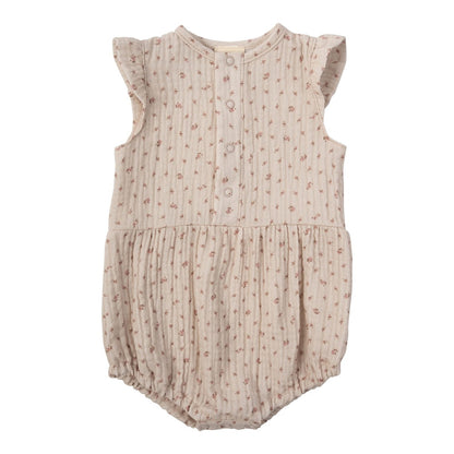 Muslin romper with wings and pink flowers.