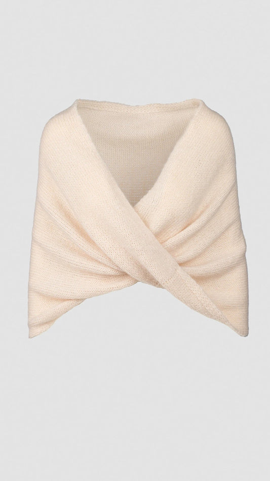 Knitted shawl with crossover design in pearl.