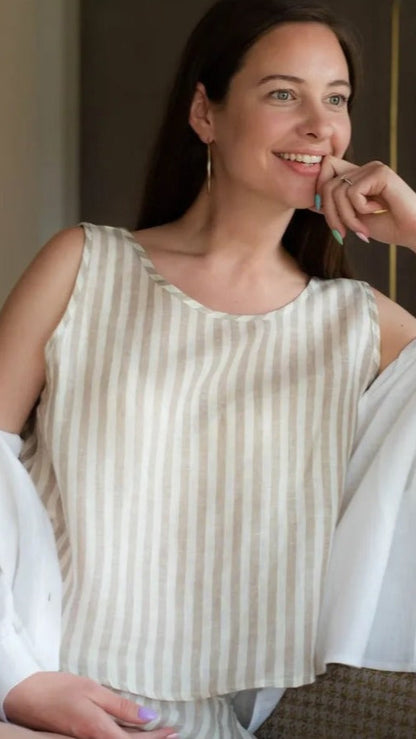 woman sitting on couch in sleepwear