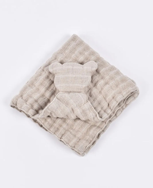 Beige linen baby blanket with soft teddy bear design on white background