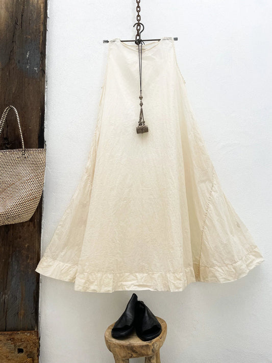 Cream cotton organzy sleeveless dress on hanger