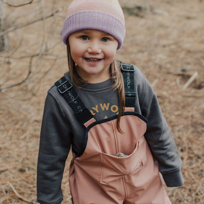 close up of waterproof overalls pink front