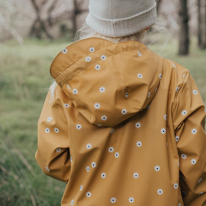 back of Waterproof kids jacket yellow with white flowers