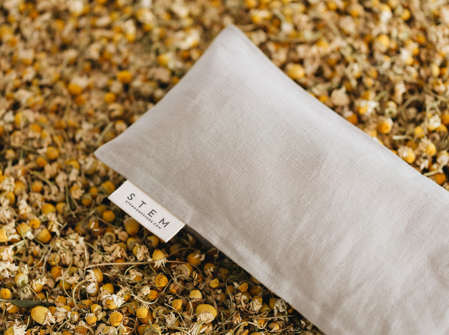 natural linen eye pillow in chamomile flowers