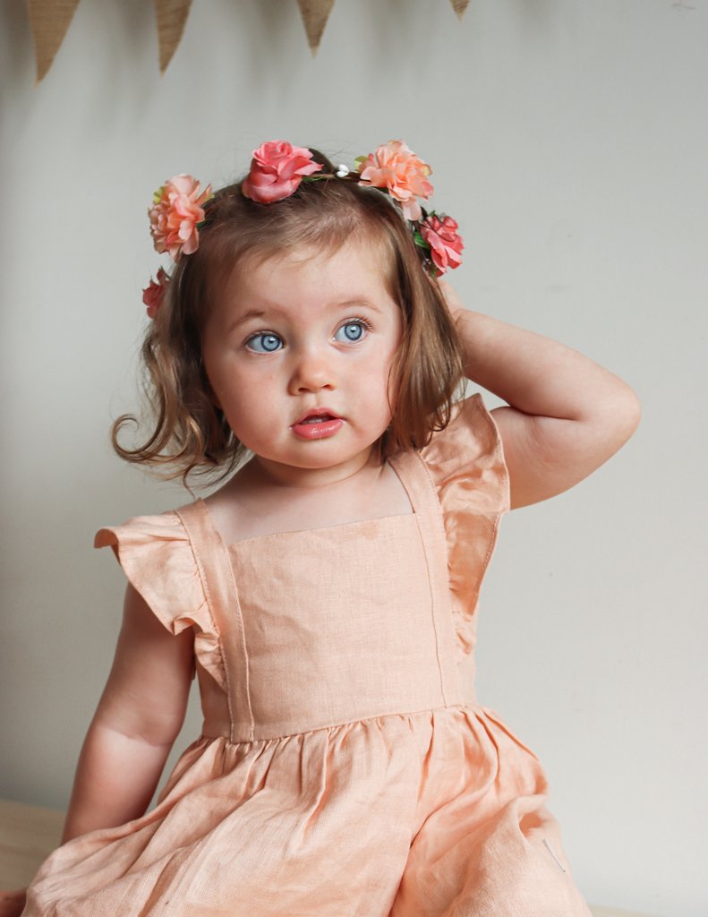 Toddler wearing linen dress